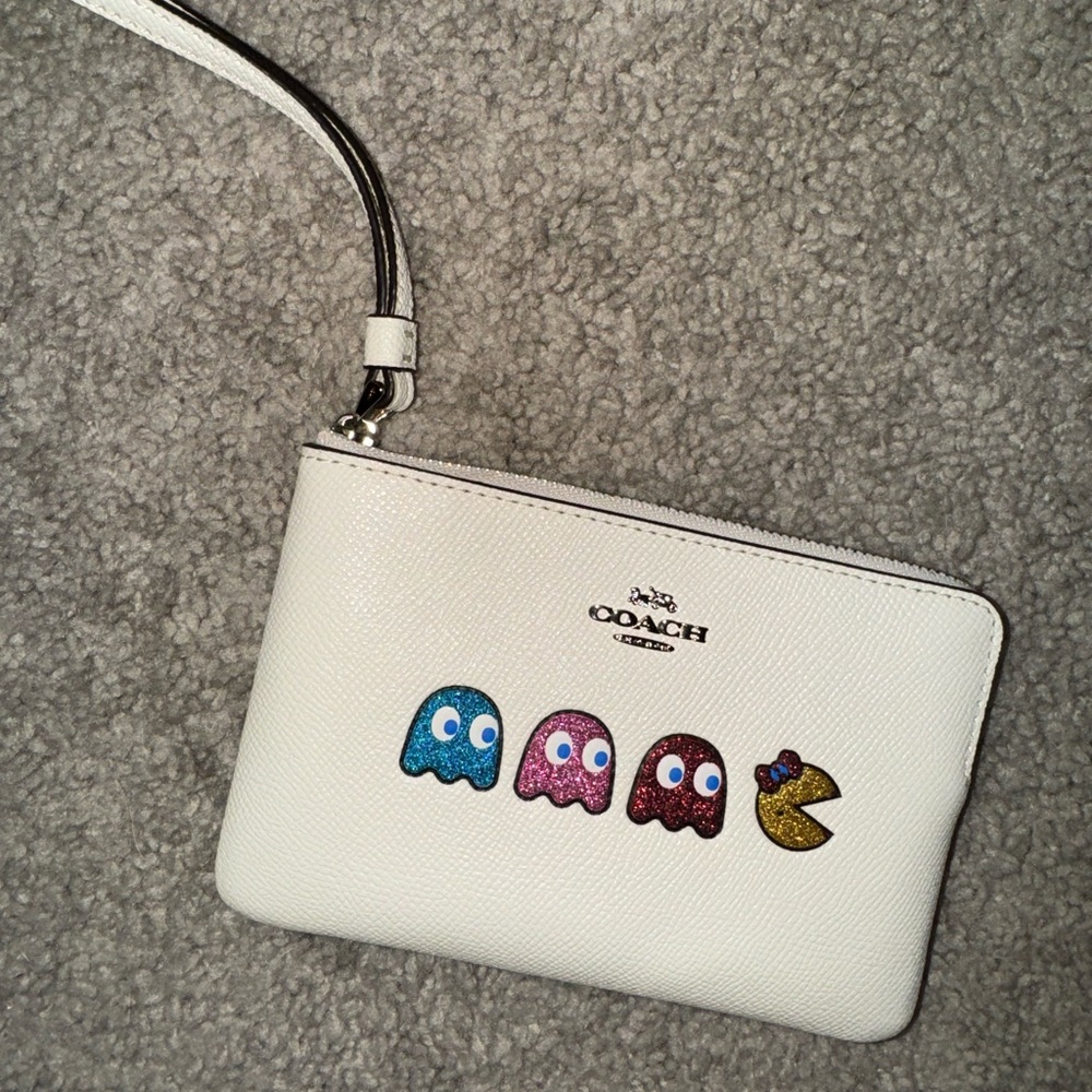COACH Pac Man Wristlet Leather. Brand new w/out tags. Never used.